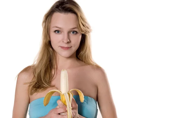 Nuori nainen banaanin kanssa — kuvapankkivalokuva