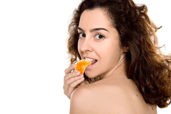 Portrait of beautiful woman with orange — Stock Photo, Image