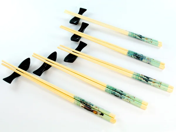 Bamboe eetstokjes op wit — Stockfoto