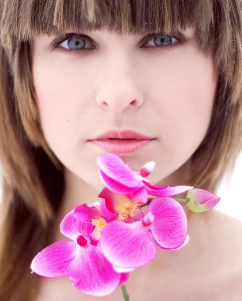 Portrait beautiful girl with orchid — Stok fotoğraf