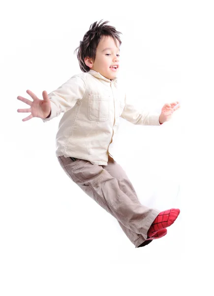 Gelukkig lachend vijf-jaar-oude jongen geïsoleerd — Stockfoto