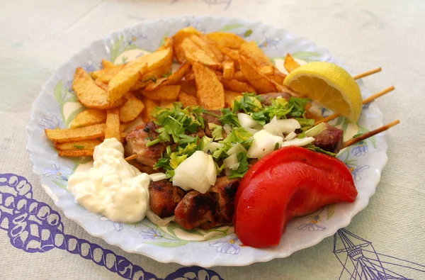 Greek meal pork souvlaki — Stock Photo, Image