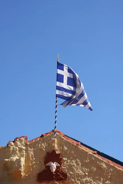 Řecká vlajka na střeše — Stock fotografie