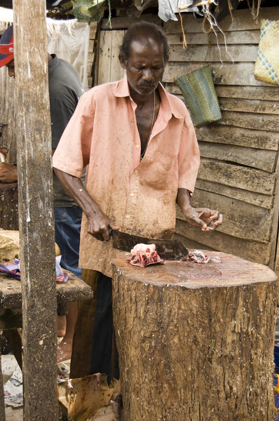 Man with meat on Market in Morocco