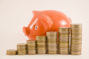 Money pig with ascending money coins clipart