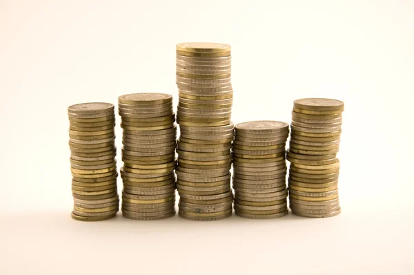 Ascending and descending money coins — Stock Photo, Image