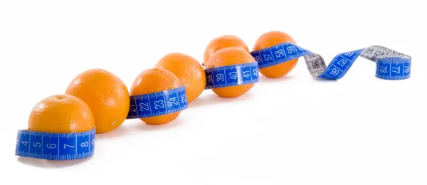 stock image Isolated oranges and measure tape