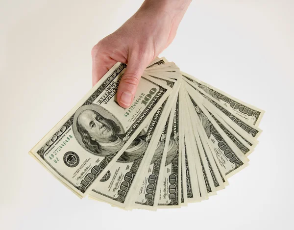Mão com notas de 100 dólares — Fotografia de Stock