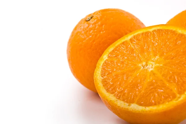 Oranje op witte achtergrond — Stockfoto