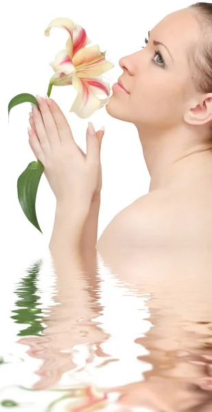 Beautiful woman with lily flower Stock Photo