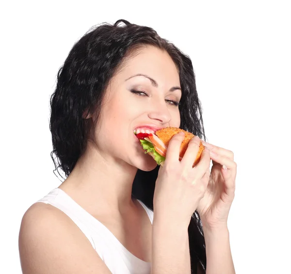 Молода жінка з гамбургером — стокове фото