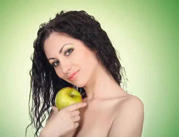 Schöne Frau mit Apfel Stockbild