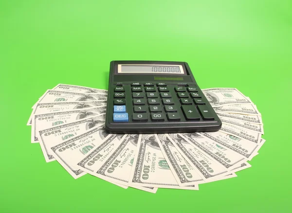 Kalkulator dan uang kertas — Stok Foto