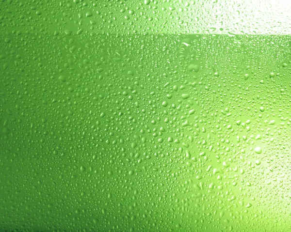 Green background with water drops — Stock Photo, Image