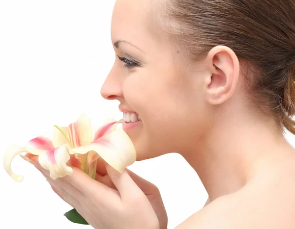 Красива жінка з квіткою лілії — стокове фото