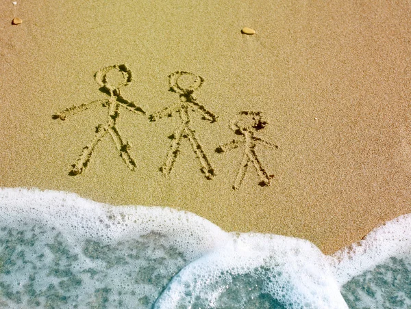 Family drawing on beach — Stock Photo, Image