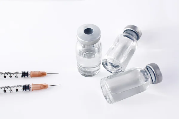 Injekční stříkačky a lahvičky Stock Snímky