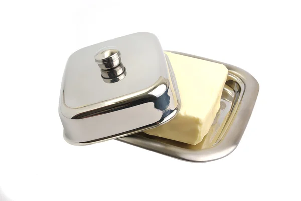 Butter in einer metallenen Butterschale — Stockfoto