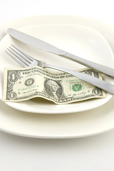 Egy dollár számlát egy tányéron evőeszközök — Stock Fotó