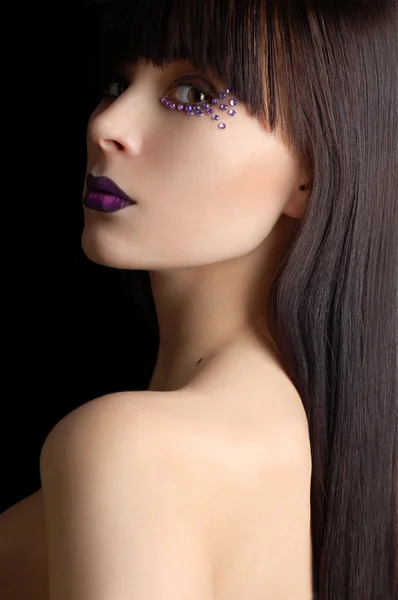 Beautiful woman with violet make-up — Stock Photo, Image