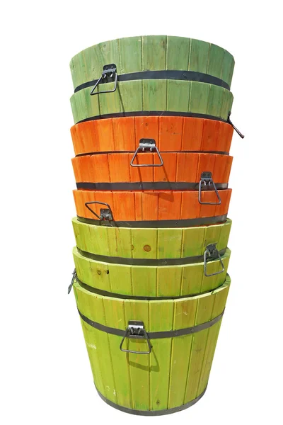 Stacked colorful wooden buckets isolated — Stock Photo, Image