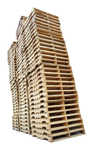 Columnas de palets de madera aisladas en blanco —  Fotos de Stock