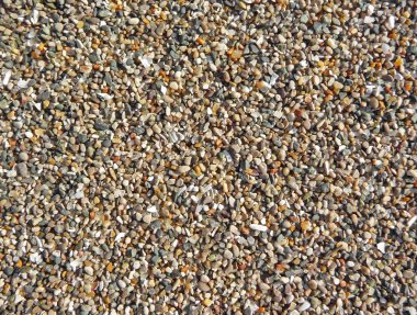 Colorful beach pebbles background clipart