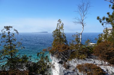 Cliff view of Georgian Bay with island clipart