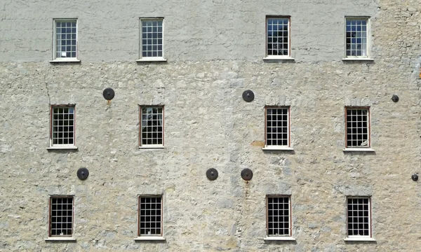 Old mill twelve windows — Stock Photo, Image