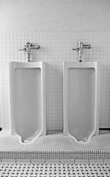 Stock image Two urinals