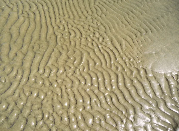 Fond des ondulations de sable marémotrice Photos De Stock Libres De Droits