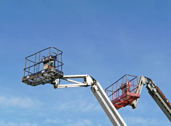Two hydraulic lift platforms Stock Picture