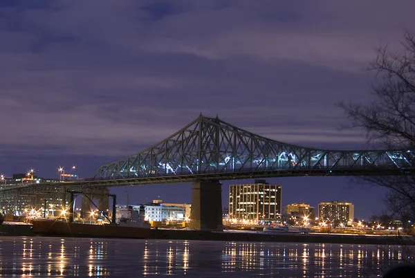 Bridge by night over ice river america — Stock Photo, Image