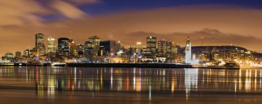 Downtown skyline panorama dusk Montreal clipart