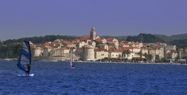 Wind surfing on adriatic historic town — Stock Photo, Image