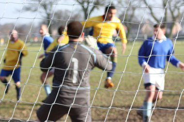 Goalkeeper shot from behind net clipart