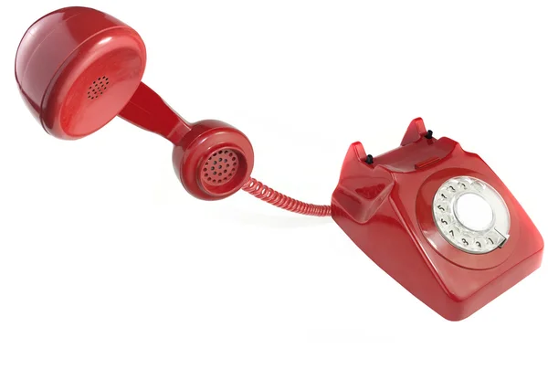 Atendendo um telefone vermelho antiquado — Fotografia de Stock