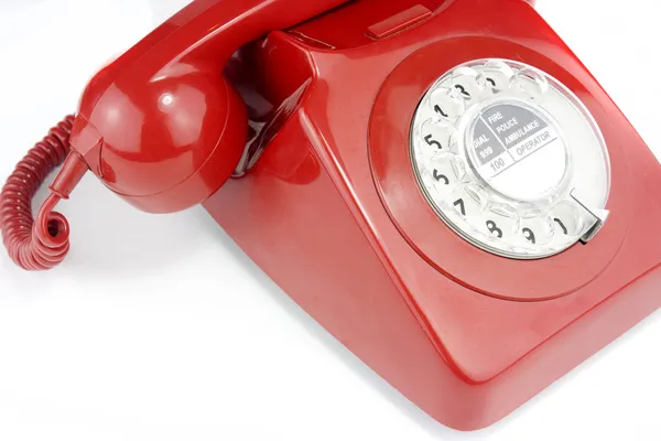 Old fashioned bright red telephone hands — Stok fotoğraf