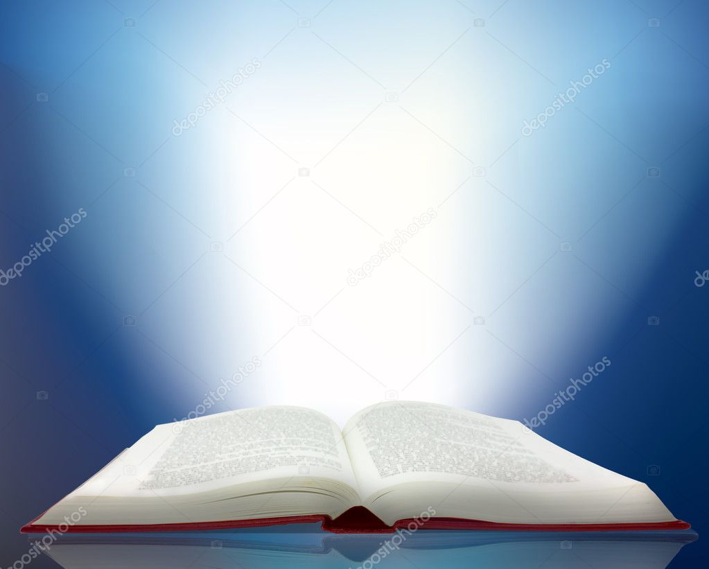 Ray of light shining from a book