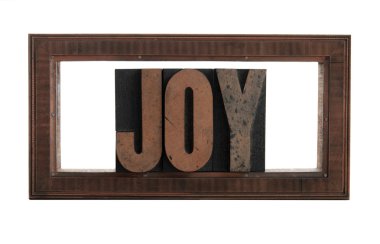 Joy in a printer's copper frame cut clipart