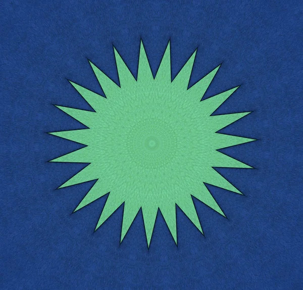 Зелёная звезда на тёмно-синем — стоковое фото
