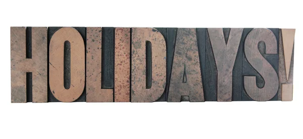 Holidays in old letterpress wood type — Stock Photo, Image