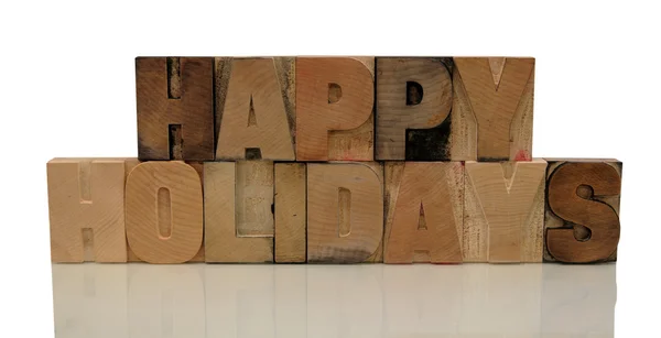 Happy holidays in letterpress wood type — Stock Photo, Image