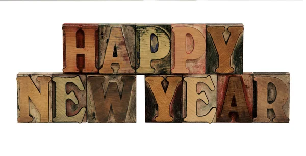 Happy New Year in letterpress wood lette — Stock Photo, Image