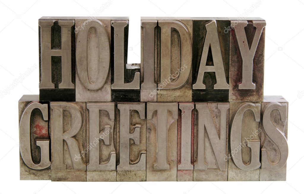 Happy holidays in metal type