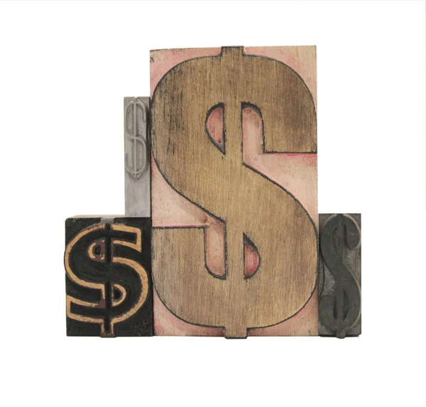 Čtyři znaky dolaru dřeva a kovu — Stock fotografie