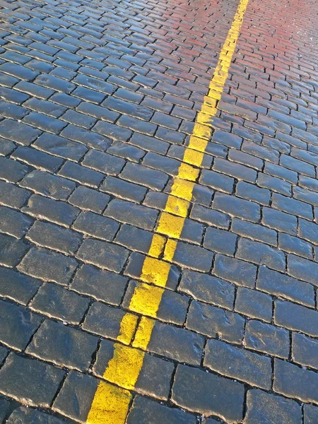 Pavement with yellow line — Stock Photo, Image