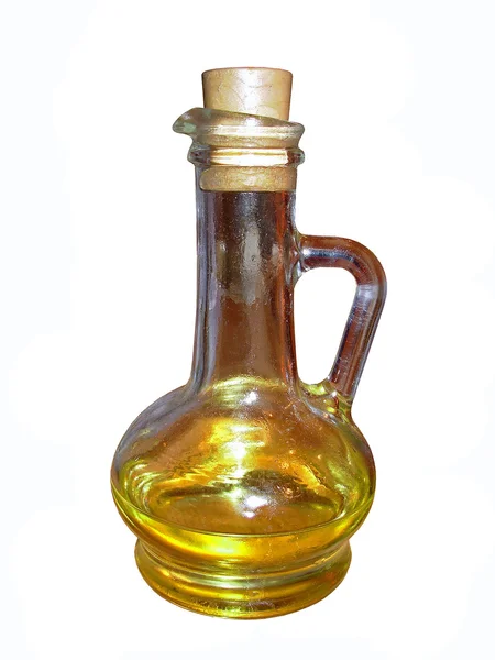 Glass bottle with yellow oil — Stock Photo, Image
