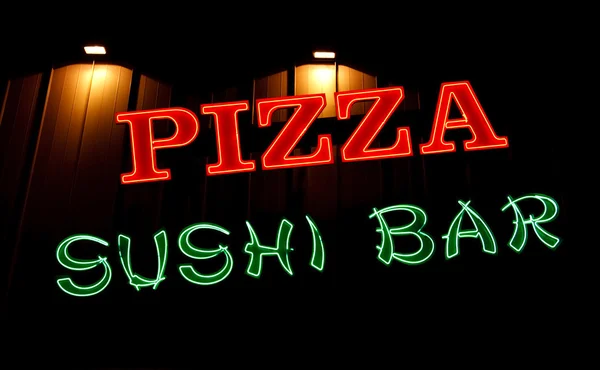 Neonreklame für Pizza und Sushi-Bar — Stockfoto