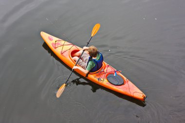 Teen in Kayak clipart